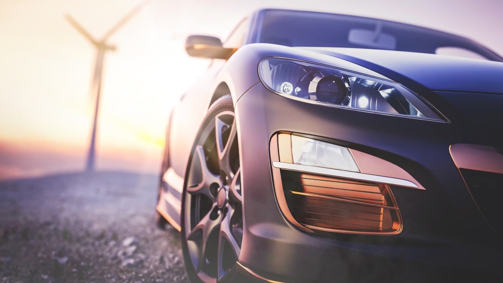 A Closeup of a Sports Car Featuring Sport Tires